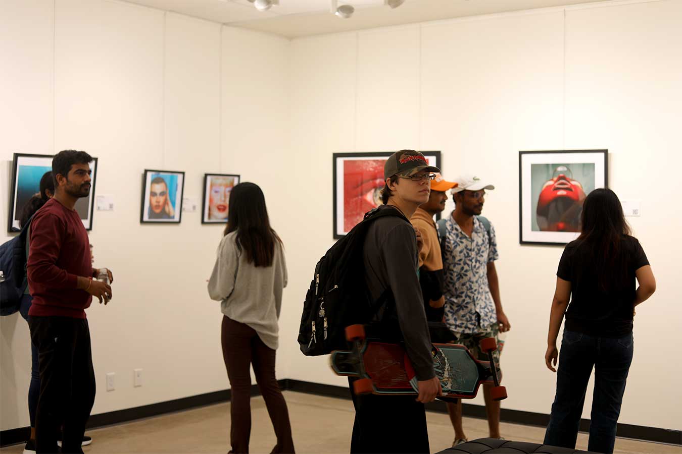 Attendees of the reception for Sam Bloom's Exhibition in the First Bank and Trust Art Gallery at DSU.