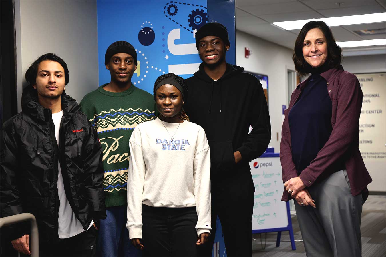 Pictured (L-to-R) Shishir Poudel, Acley Bujune, Tracey Kwarteng, William Osei-Hwere, and Nicole Claussen.